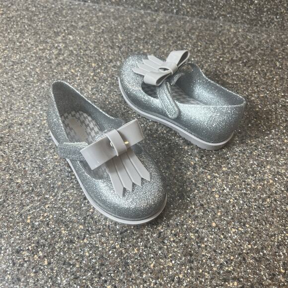 Mini Melissa Kids Little Girl Toddler Sz 7 Silver Glitter Bow Tassel Rubber Shoe - Picture 1 of 10